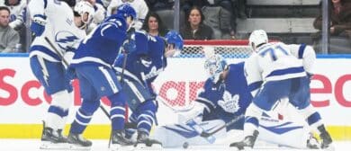 Toronto Maple Leafs goaltender Joseph Woll (60) stops the puck as Tampa Bay Lightning center Anthony Cirelli (71) looks for the rebound during the third period at Scotiabank Arena.