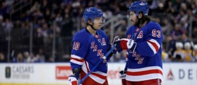 New York Rangers left wing Artemi Panarin (10) and New York Rangers center Mika Zibanejad (93) talk to one another during the second period against the Nashville Predators at Madison Square Garden.