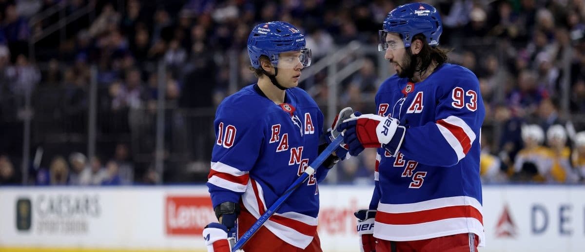 New York Rangers left wing Artemi Panarin (10) and New York Rangers center Mika Zibanejad (93) talk to one another during the second period against the Nashville Predators at Madison Square Garden.