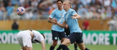 Manchester City forward Erling Haaland (9) battles for the ball against Juventus FC defender Nicolo Savona (37) during the second half during a group stage match of the 2025 FIFA Club World Cup at Camping World Stadium.