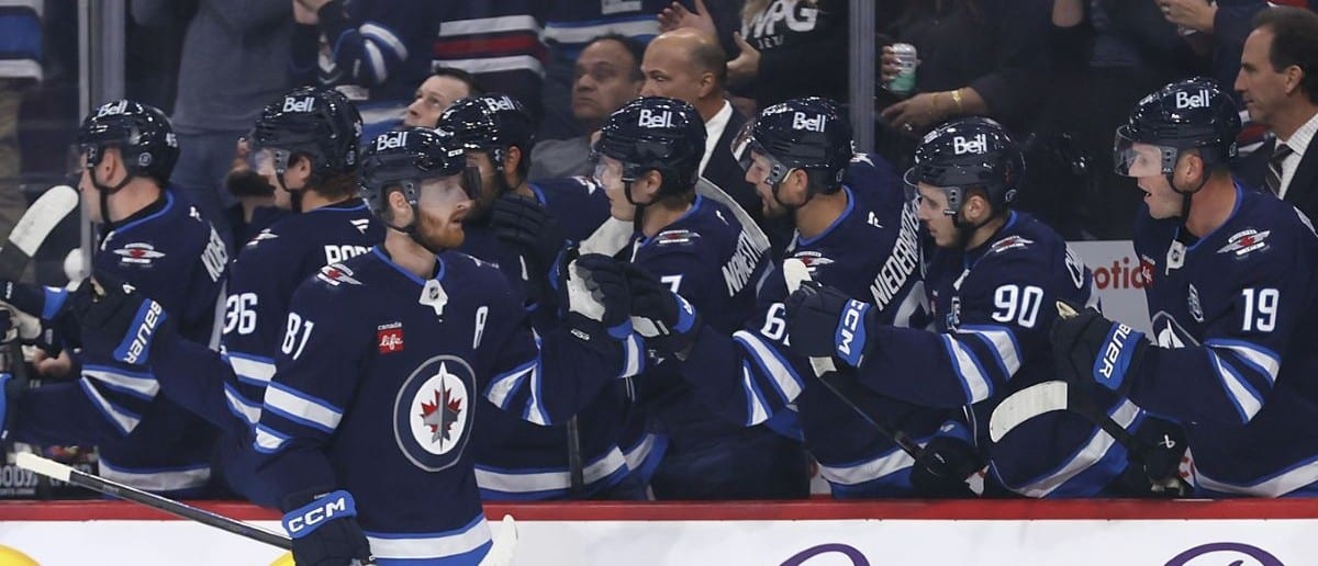 Winnipeg Jets left wing Kyle Connor (81) celebrates his goal against the Dallas Stars during the first period at Canada Life Centre