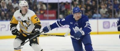 Toronto Maple Leafs forward Bobby McMann (74) and Pittsburgh Penguins forward Evgeni Malkin (71) battle for position during the first period at Scotiabank Arena