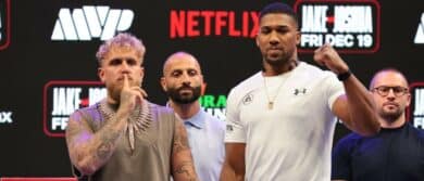 Jake Paul and Anthony Joshua face off after a press conference announcing their heavyweight boxing match at Kayesa Center.