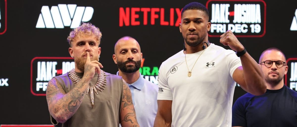 Jake Paul and Anthony Joshua face off after a press conference announcing their heavyweight boxing match at Kayesa Center.