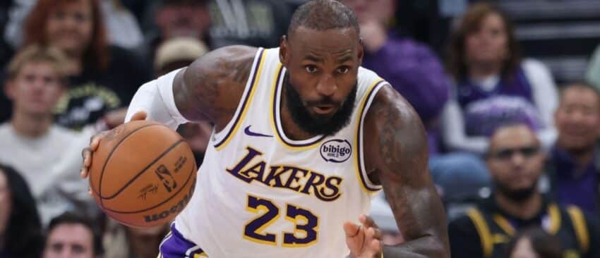 ; Los Angeles Lakers forward LeBron James (23) brings the ball up the court against the Utah Jazz during the first half at Delta Center.