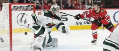 Chicago Blackhawks center Connor Bedard (98) scores a goal on Minnesota Wild goaltender Filip Gustavsson (32) during the second period at United Center.