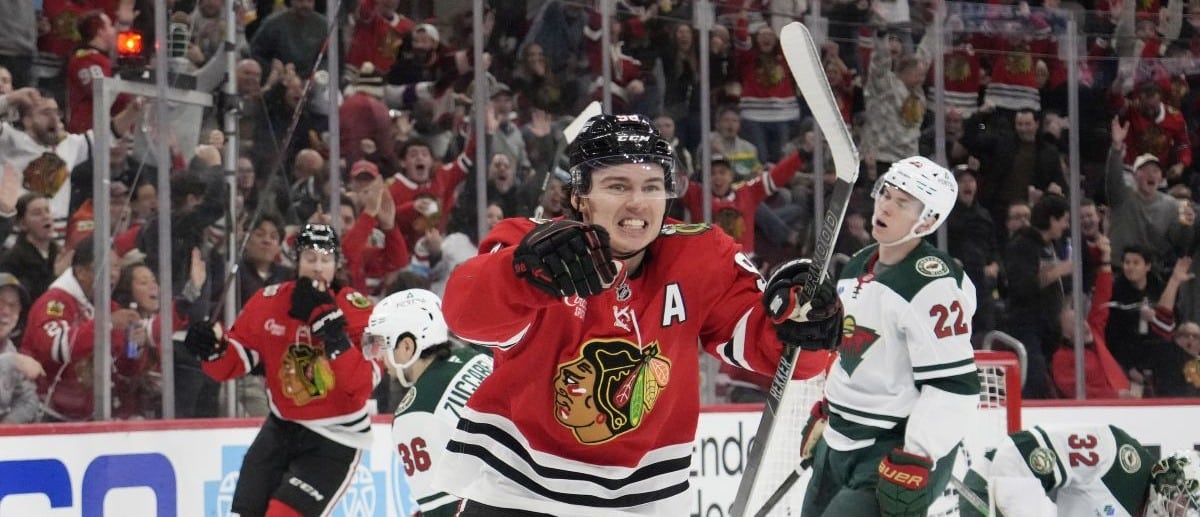 Chicago Blackhawks center Connor Bedard (98) celebrates his gaol against the Minnesota Wild during the second period at United Center.