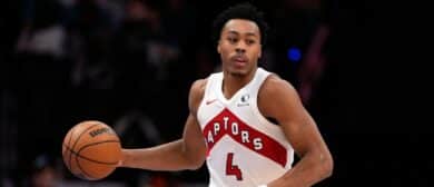 Toronto Raptors forward Scottie Barnes (4) brings the ball up court against the Charlotte Hornets during the second half at Spectrum Center.