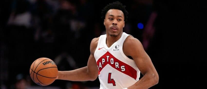 Toronto Raptors forward Scottie Barnes (4) brings the ball up court against the Charlotte Hornets during the second half at Spectrum Center.