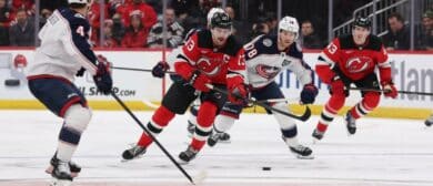 New Jersey Devils center Nico Hischier (13) skates with the puck against the Columbus Blue Jackets during the second period at Prudential Center.