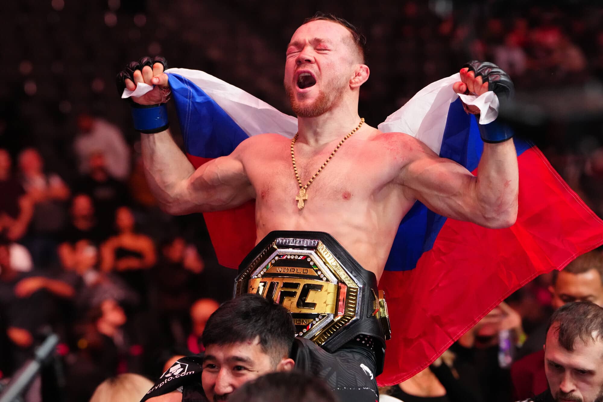 Petr Yan celebrates at UFC 323 after defeating Merab Dvalishvili for the UFC Bantamweight Championship