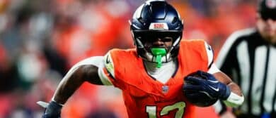 Denver Broncos running back RJ Harvey (12) runs for a gain during the third quarter against the Green Bay Packers at Empower Field at Mile High