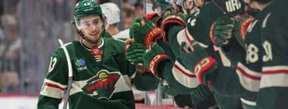 Minnesota Wild defensemen Quinn Hughes (43) celebrates after scoring a goal against the Boston Bruins during the third period at Grand Casino Arena.