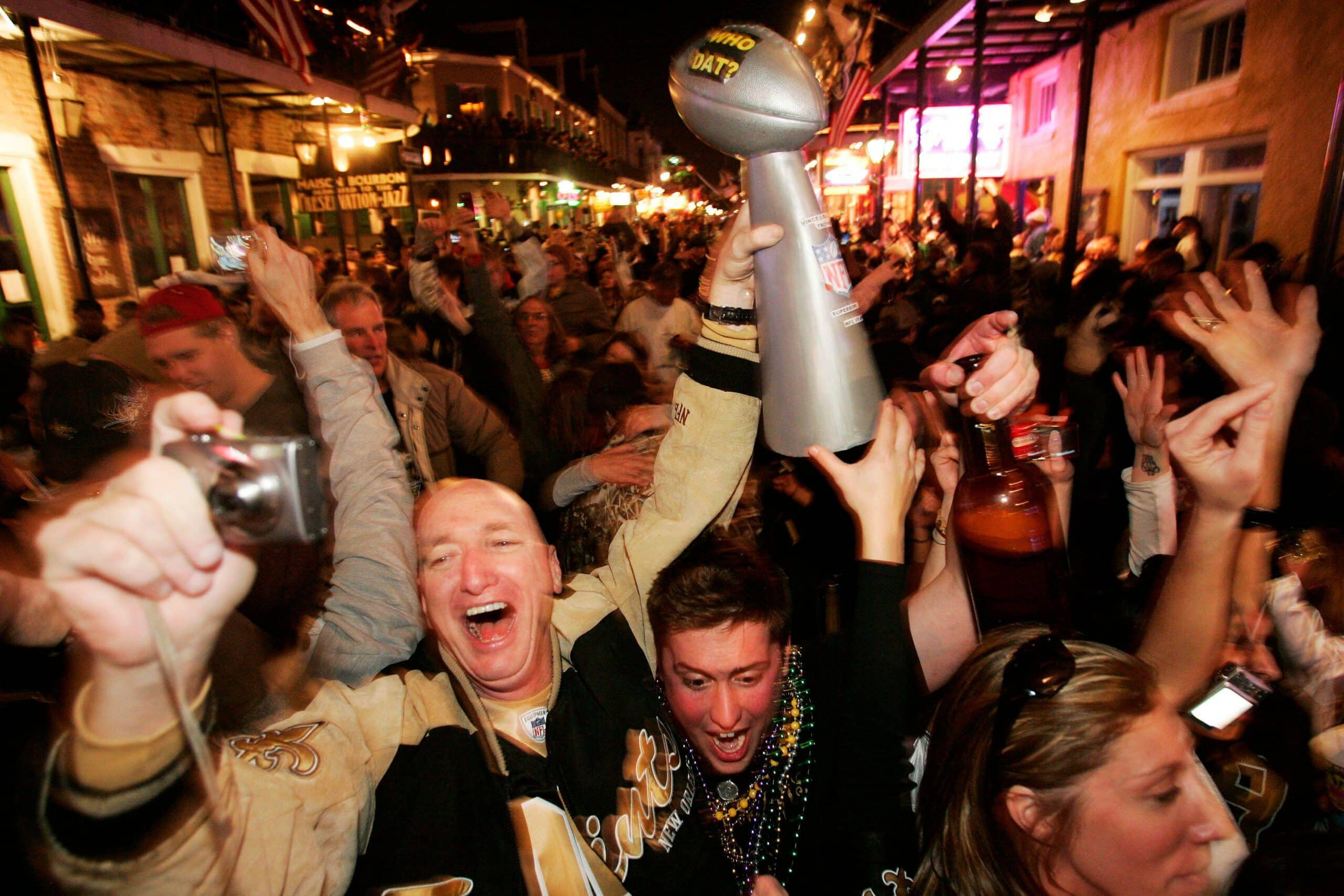 Super Bowl fans celebrating on Bourbon Street in New Orleans