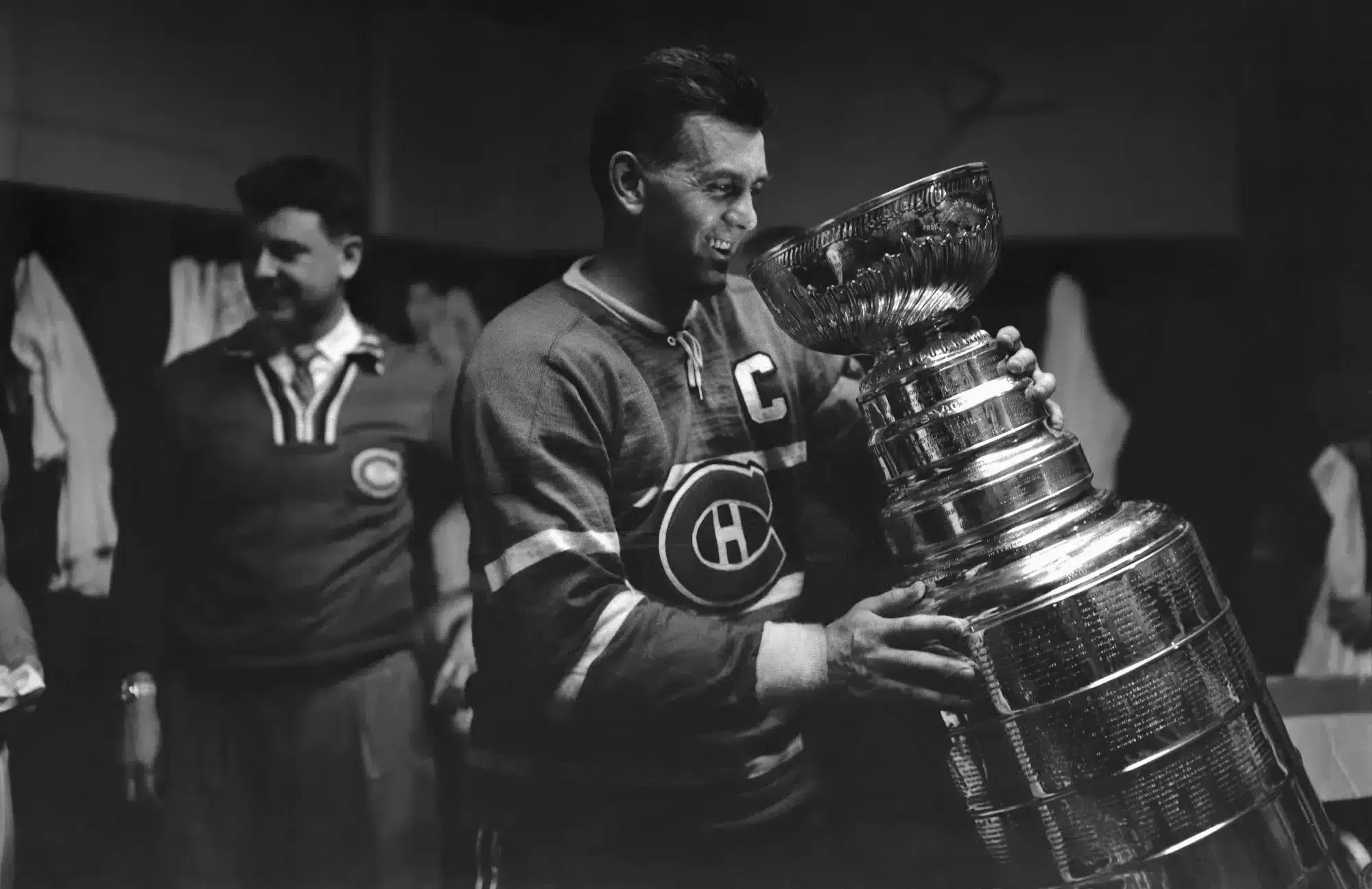Maurice "Rocket" Richard, Captain of the Montreal Canadiens, holds the Stanley Cup on April 20th, 1958.