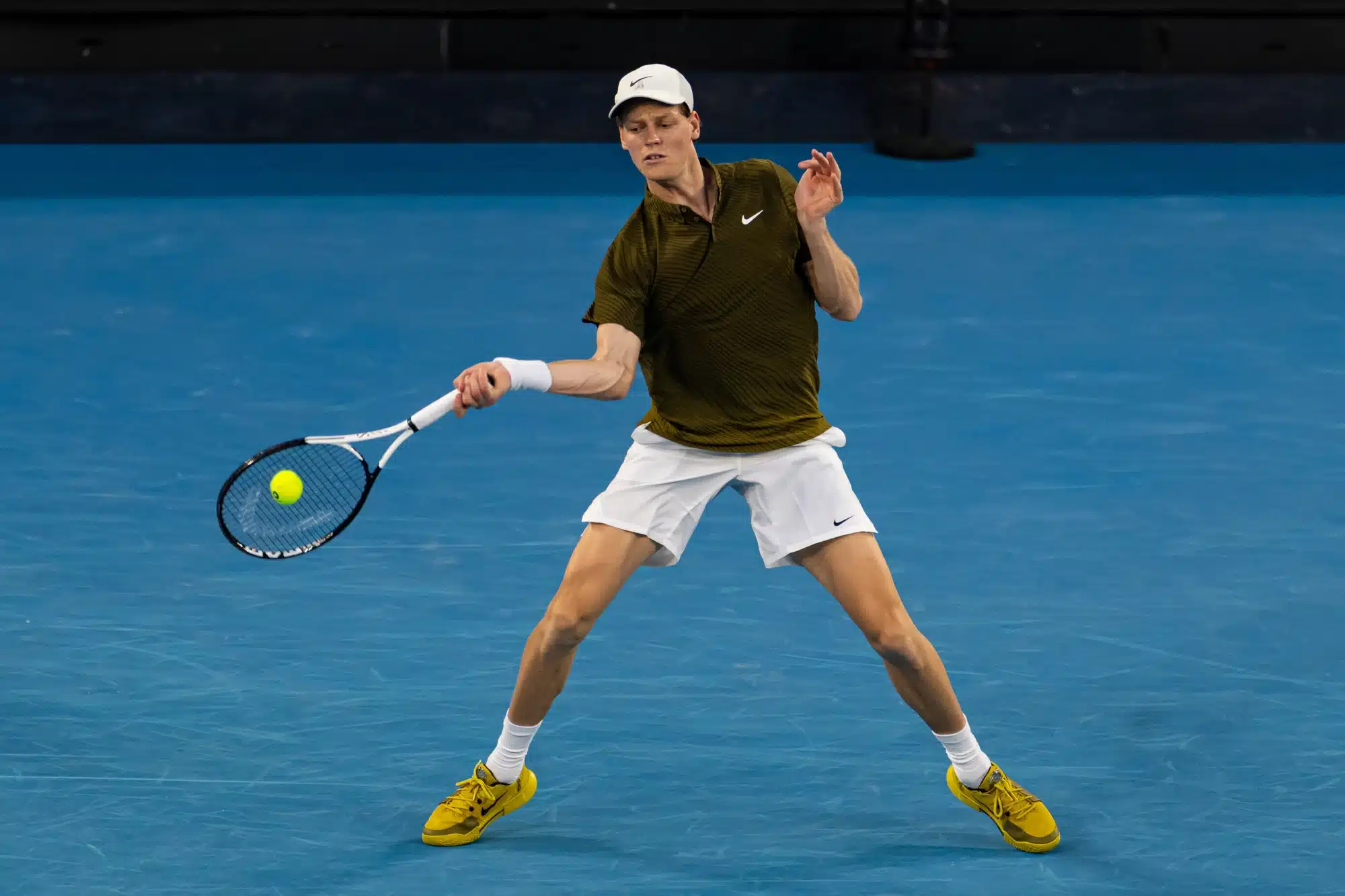Jan 26, 2026; Melbourne, Victoria, Australia; Jannik Sinner of Italy in action against Luciano Darderi of Italy in the fourth round of the menรญs singles at the Australian Open at Margaret Court Arena in Melbourne Park