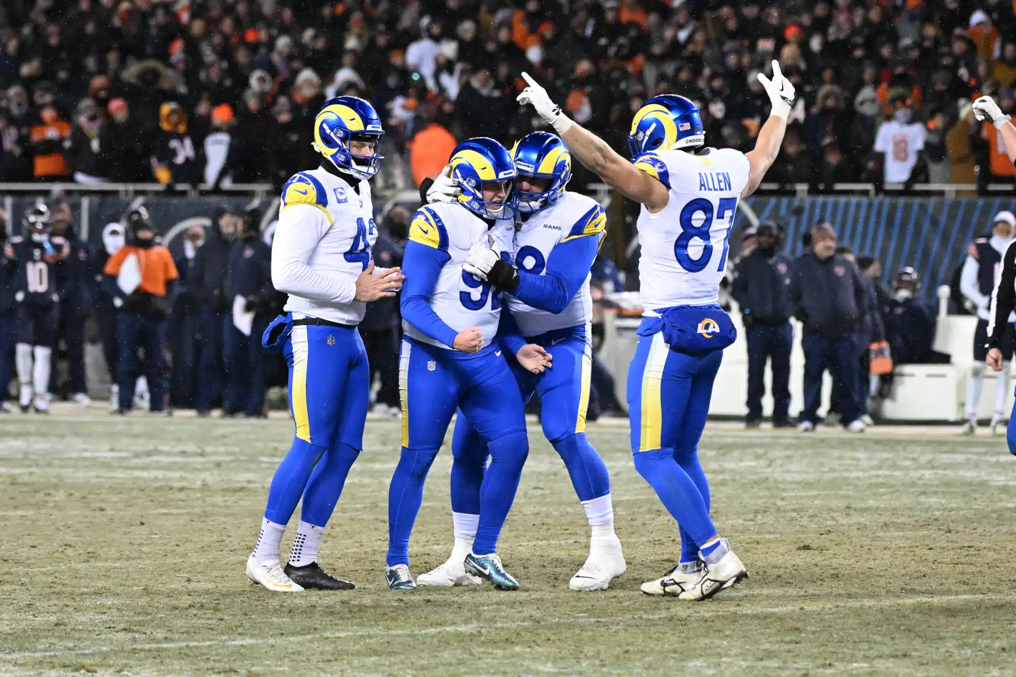 Jan 18, 2026; Chicago, IL, USA; Los Angeles Rams placekicker Harrison Mevis (92) celebrates with punter Ethan Evans (42), offensive tackle David Quessenberry (68) and tight end Davis Allen (87) after kicking the game-winning field goal against the Chicago Bears during overtime of an NFC Divisional Round game at Soldier Field. 