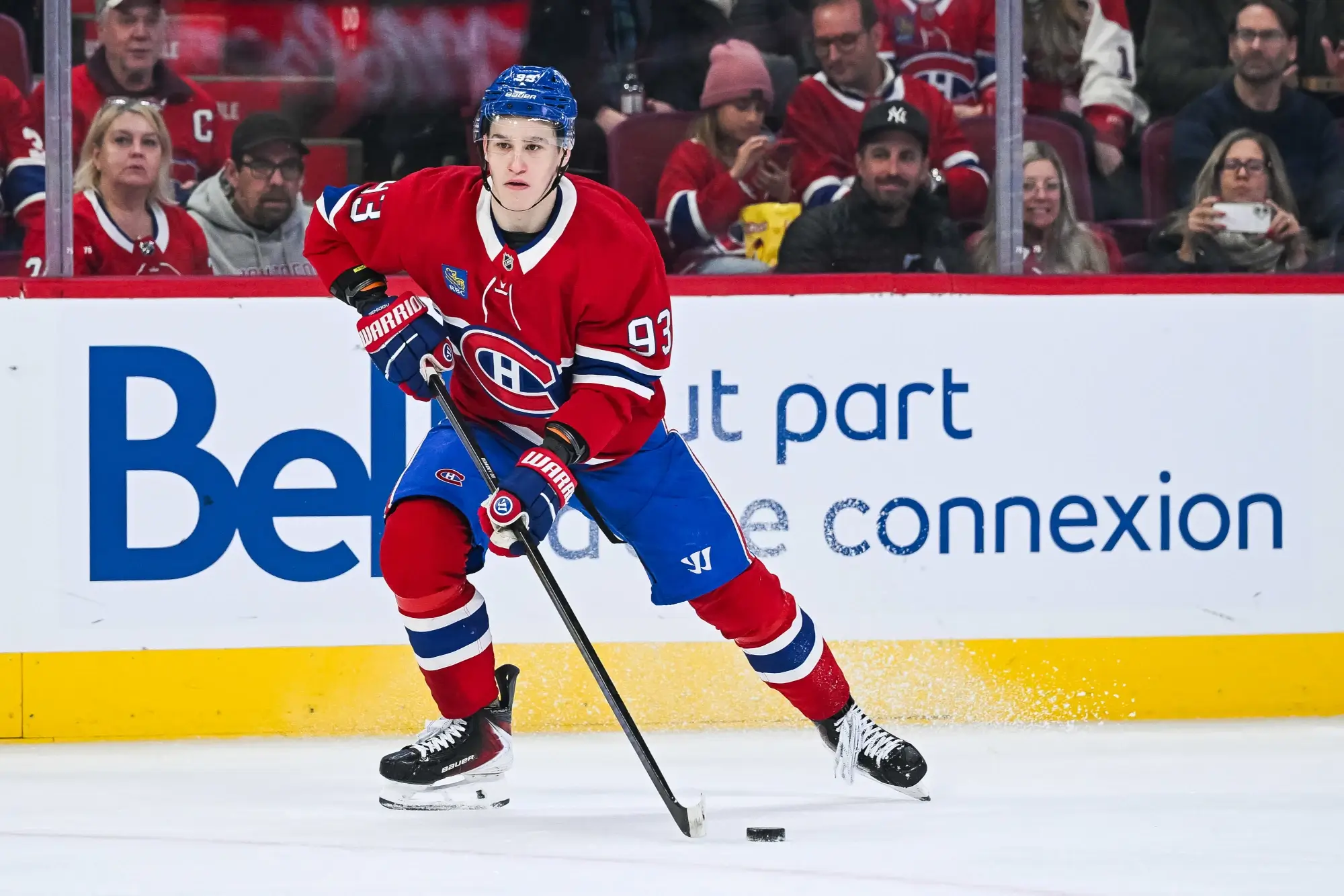 Jan 12, 2026; Montreal, Quebec, CAN; Montreal Canadiens right wing Ivan Demidov (93) plays the puck against the Vancouver Canucks during the second period at Bell Centre.