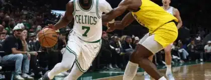 Jan 21, 2026; Boston, Massachusetts, USA; Boston Celtics guard Jaylen Brown (7) drives on Indiana Pacers forward Jarace Walker (5) during the second quarter at TD Garden.