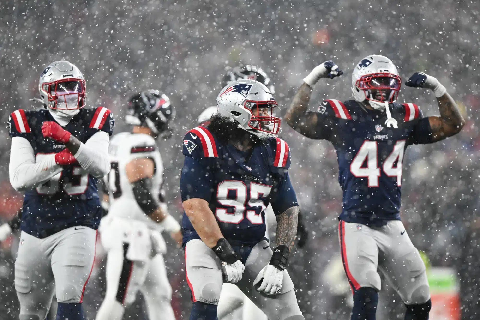 Jan 18, 2026; Foxborough, MA, USA; New England Patriots defensive lineman Khyiris Tonga (95) reacts after a sack in the fourth quarter against the Houston Texans in an AFC Divisional Round game at Gillette Stadium.