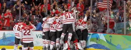 Team Canada's men's Olympic Hockey team celebrates winning the gold medal at the 2010 Winter Olympics.