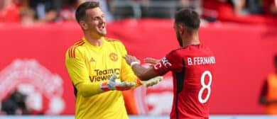 Manchester United midfielder Bruno Fernandes (8) celebrates his goal with goalkeeper Thomas Heaton (22) during the first half at MetLife Stadium.