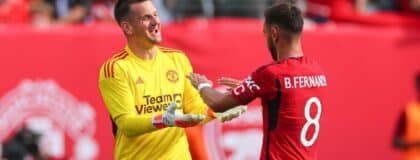 Manchester United midfielder Bruno Fernandes (8) celebrates his goal with goalkeeper Thomas Heaton (22) during the first half at MetLife Stadium.