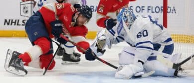 Toronto Maple Leafs goaltender Joseph Woll (60) makes a save against Florida Panthers left wing A.J. Greer (10) during the first period at Amerant Bank Arena