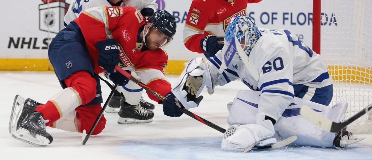 Toronto Maple Leafs goaltender Joseph Woll (60) makes a save against Florida Panthers left wing A.J. Greer (10) during the first period at Amerant Bank Arena