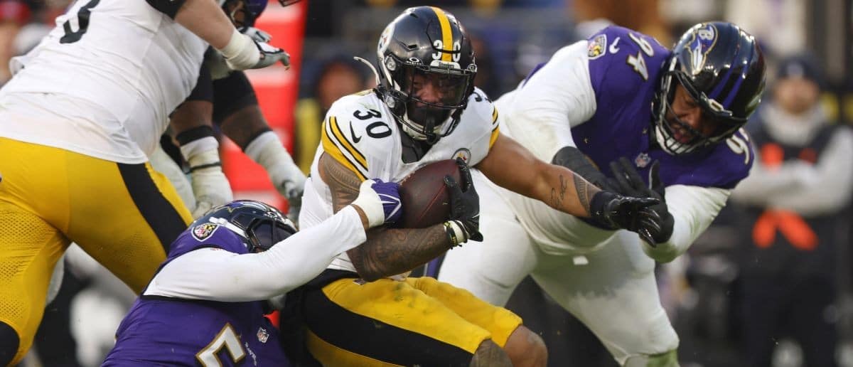 Baltimore Ravens linebacker Kyle van Noy (53) tackles Pittsburgh Steelers running back Jaylen Warren (30) during the second half at M&T Bank Stadium.