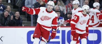 Detroit Red Wings right wing Patrick Kane (88) celebrates after scoring against the Chicago Blackhawks during the first period at United Center.