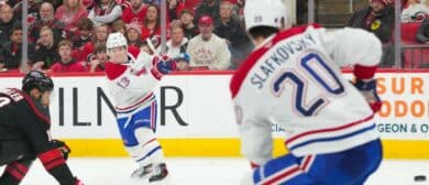 Montréal Canadiens right wing Cole Caufield (13) takes a shot against the Carolina Hurricanes during the second period at Lenovo Center.