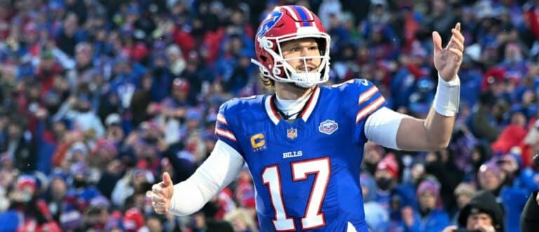 Buffalo Bills quarterback Josh Allen (17) runs onto the field before the game against the New York Jets at Highmark Stadium.