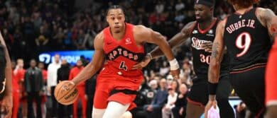 Toronto Raptors forward Scottie Barnes (4) dribbles the ball past Philadelphis 76ers center Adam Bona (30) in the second half at Scotiabank Arena