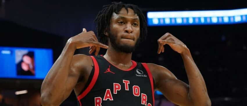 Toronto Raptors guard Immanuel Quickley (5) celebrates after making a three-pointer against the Golden State Warriors in the third quarter at Chase Center.