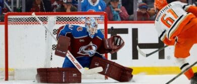 Colorado Avalanche goaltender Scott Wedgewood (41) deflects a shot from Anaheim Ducks left wing Cutter Gauthier (61) in overtime at Ball Arena.