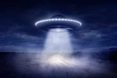 UFO hovering above a rural road at night, illustrating the Alien Abduction Odds Index 2026 and regional UFO hotspot rankings.