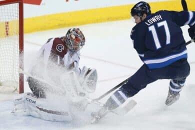 Colorado Avalanche goalie Semyon Varlamov stopping a breakaway against the Winnipeg Jets