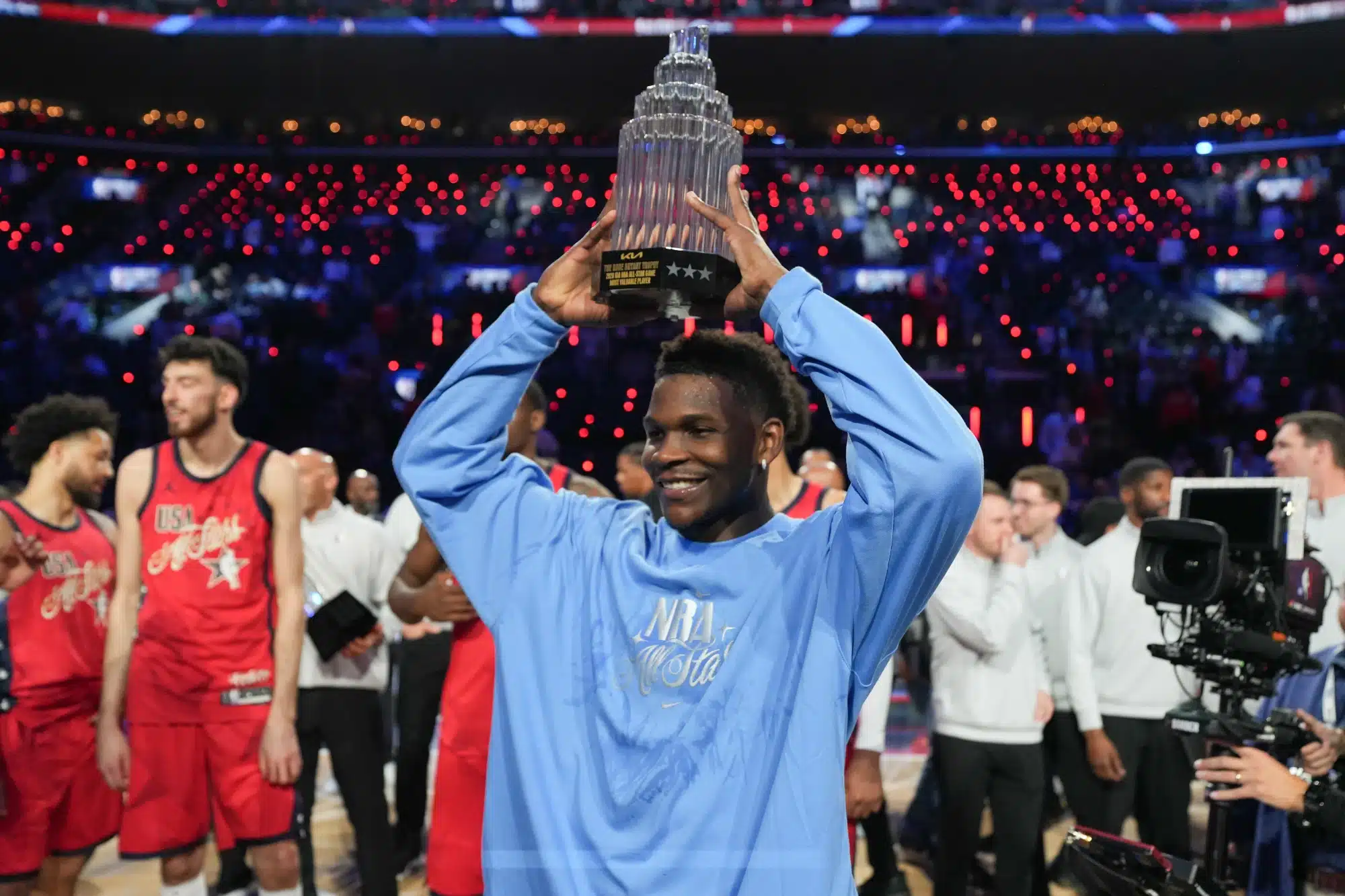 Feb 15, 2026; Inglewood, California, USA; Team USA Stars guard Anthony Edwards (5) of the Minnesota Timberwolves poses with the MVP trophy after the 75th NBA All Star Game at Intuit Dome. 