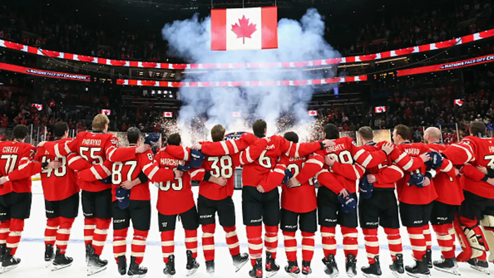 A view of Team Canada's men's hockey team signing the national anthem after winning gold at the Four Nations Tournament.
