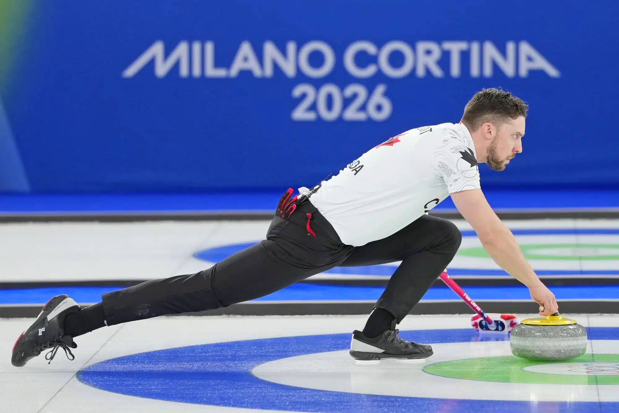 Feb 5, 2026; Cortina d'Ampezzo, Italy; Brett Gallant of Team Canada during curling mixed doubles round robin competition during the Milano Cortina 2026 Olympic Winter Games at Cortina Curling Olympic Stadium.