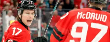 Feb 18, 2026; Milan, Italy; Macklin Celebrini of Canada celebrates with Connor McDavid after scoring their first goal against Czechia in a men's ice hockey quarterfinal during the Milano Cortina 2026 Olympic Winter Games at Milano Santagiulia Ice Hockey Arena.