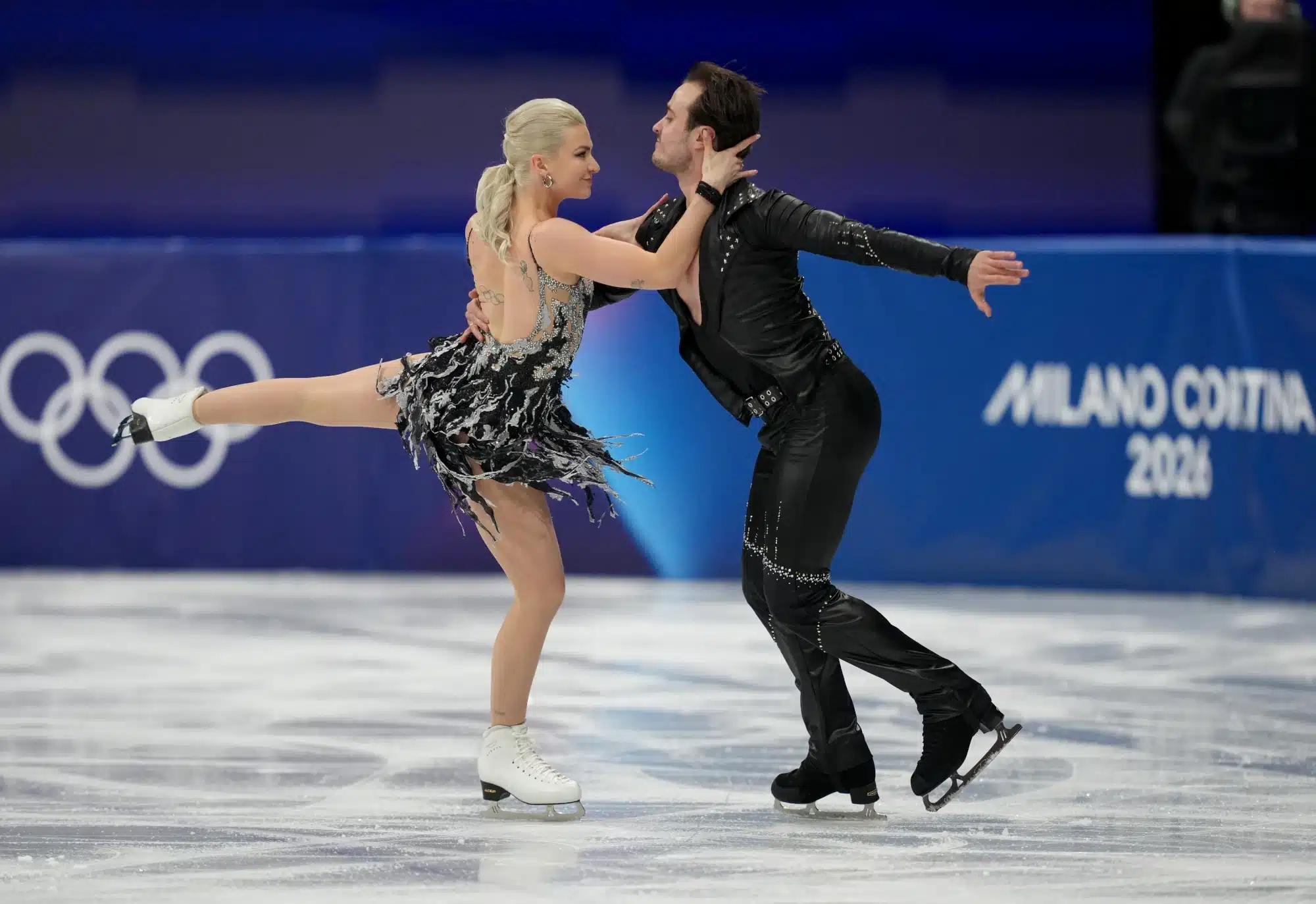 Feb 9, 2026; Milan, Italy; Olivia Smart and Tim Dieck of Spain skate during ice dancing at the Milano Cortina 2026 Olympic Winter Games at Milano Ice Skating Arena. 