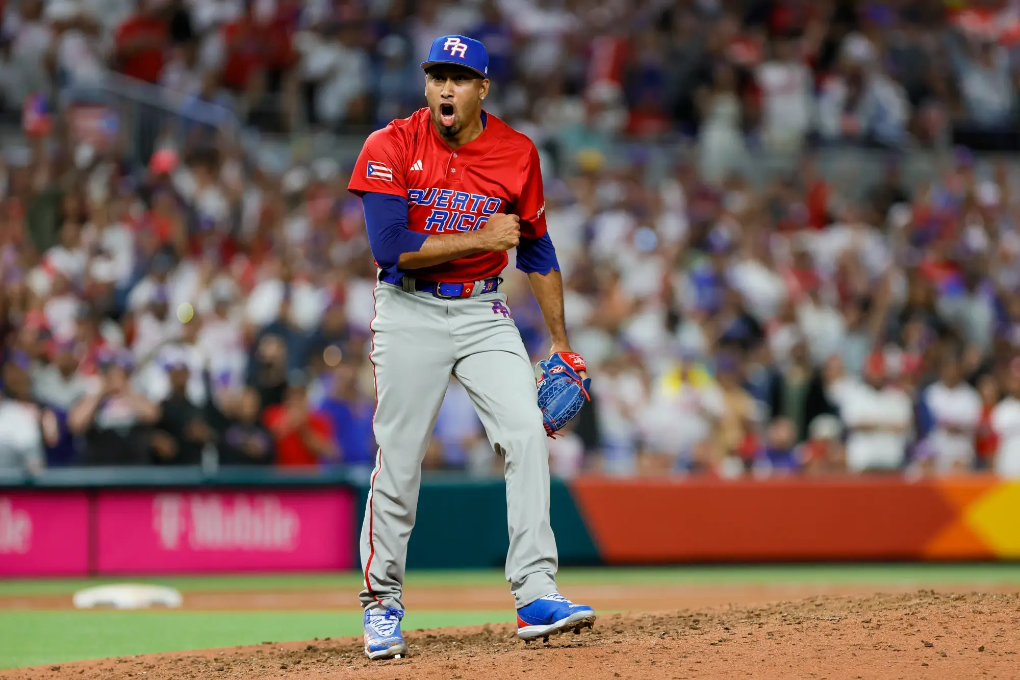 Mar 15, 2023; Miami, Florida, USA; Puerto Rico relief pitcher Edwin Diaz (39) reacts during the ninth inning against Dominican Republic at LoanDepot Park. 