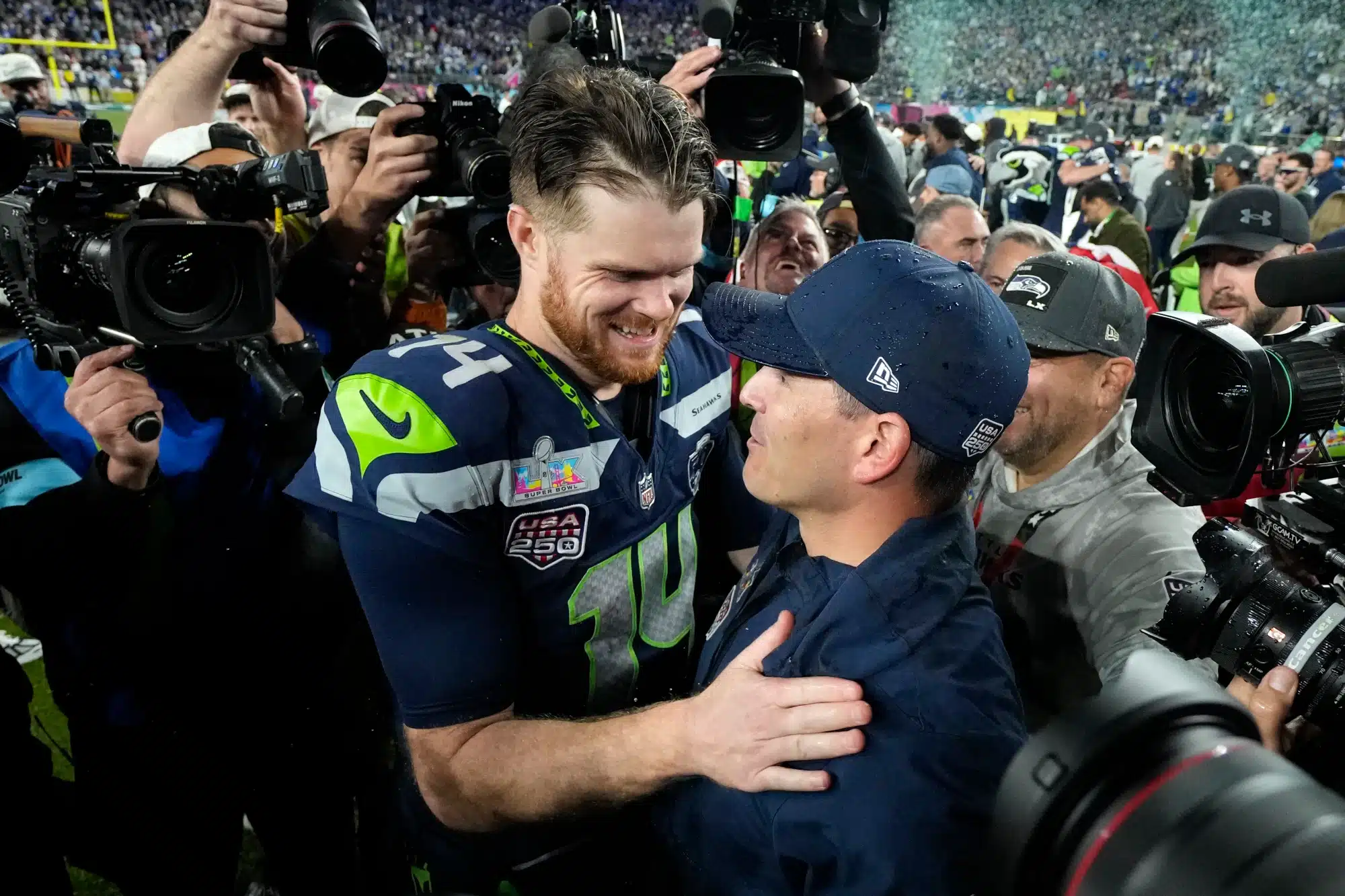 Feb 8, 2026; Santa Clara, CA, USA; Seattle Seahawks head coach Mike MacDonald celebrates with quarterback Sam Darnold (14) after defeating the New England Patriots in Super Bowl LX at Levi's Stadium. 