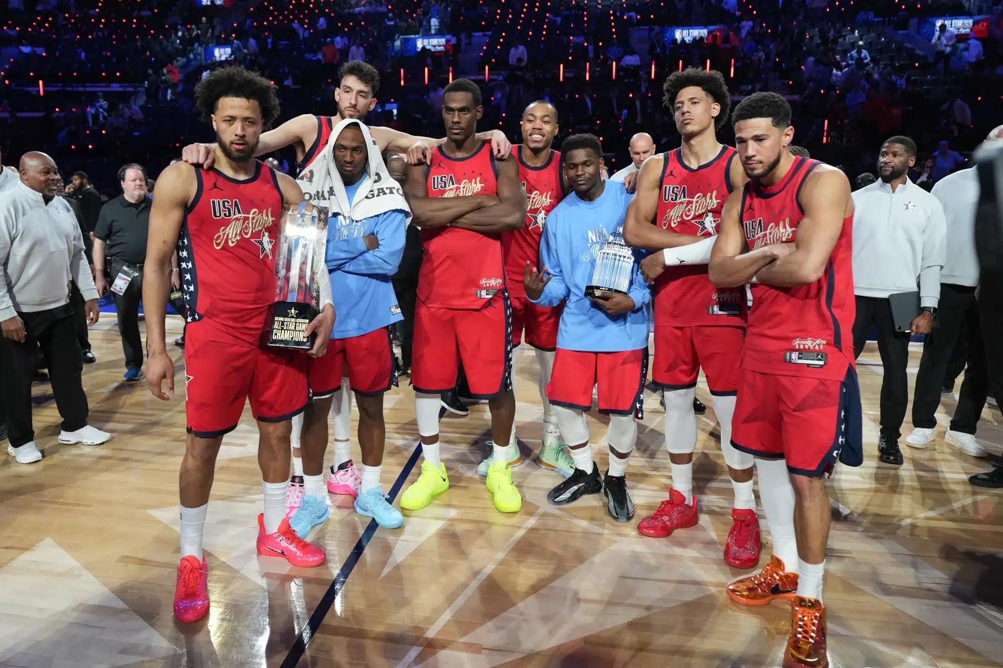 Feb 15, 2026; Inglewood, California, USA; Team USA Stars players, forward Scottie Barnes of the Toronto Raptors (4), guard Devin Booker of the Phoenix Suns (1), guard Cade Cunningham (2)and center Jalen Duren (0) of the Detroit Pistons, guard Anthony Edwards of the Minnesota Timberwolves, center Chet Holmgren of the Oklahoma City Thunder (7), forward Jalen Johnson of the Atlanta Hawks and guard Tyrese Maxey of the Philadelphia 76ers (0), pose for a photo after winning the All Star Championships against Team Stripes during the 75th NBA All Star Game at Intuit Dome.