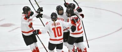 Canada forward Marie-Philip Poulin (29) celebrates with team mates after scoring a goal against the USA in the first period at CAA Center.