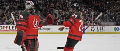 Team Canada forward Natalie Spooner (24) celebrates her power play goal against Team USA with goalie Ann-Renee Desbiens (35)during the first period of a Rivalry Series women's ice hockey game at Xcel Energy Center.