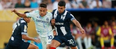 FC Inter Milan forward Lautaro Martinez (10) makes a pass during the second half as CF Monterrey midfielder Jorge Rodriguez (30) defends during a group stage match of the 2025 FIFA Club World Cup at Rose Bowl Stadium.