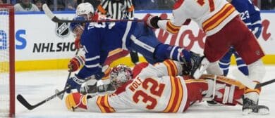 Toronto Maple Leafs forward John Tavares (91) tries to score against Calgary Flames goaltender Dustin Wolf (32) during the third period at Scotiabank Arena